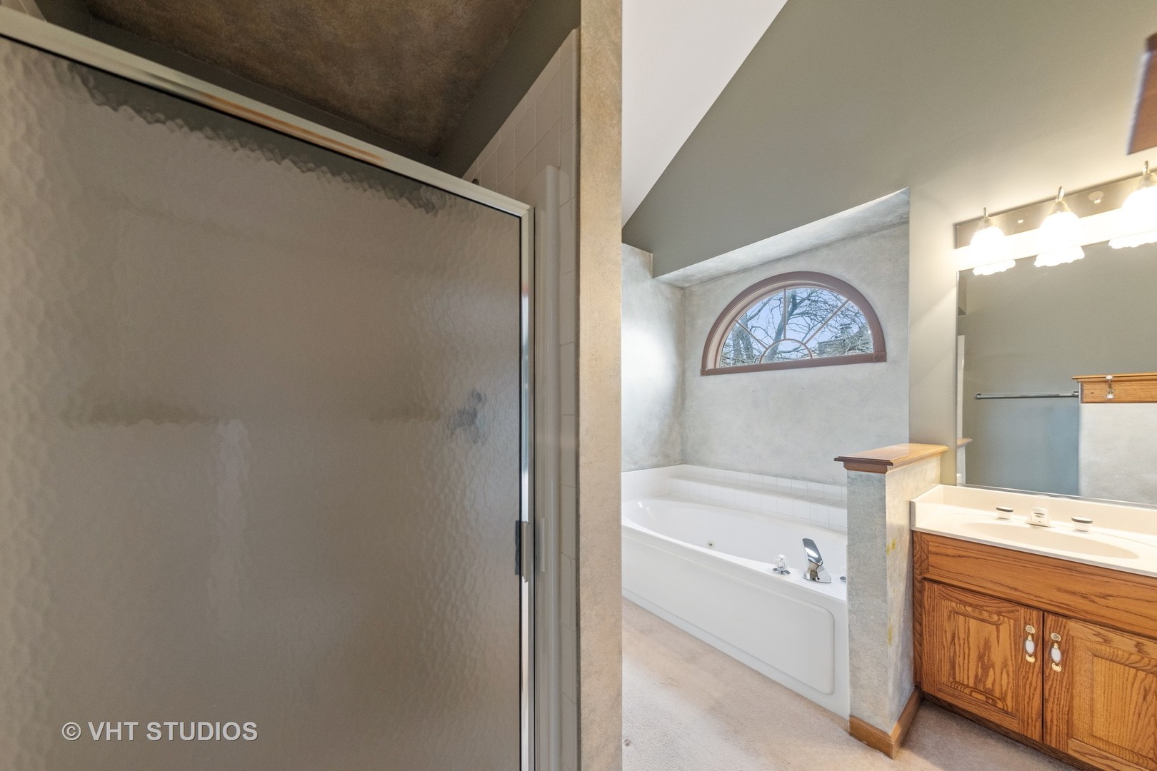 2286 Brookside Lane Aurora, IL 60502 - Photo 17 of 37 a bathroom with a bathtub vanity and a shower