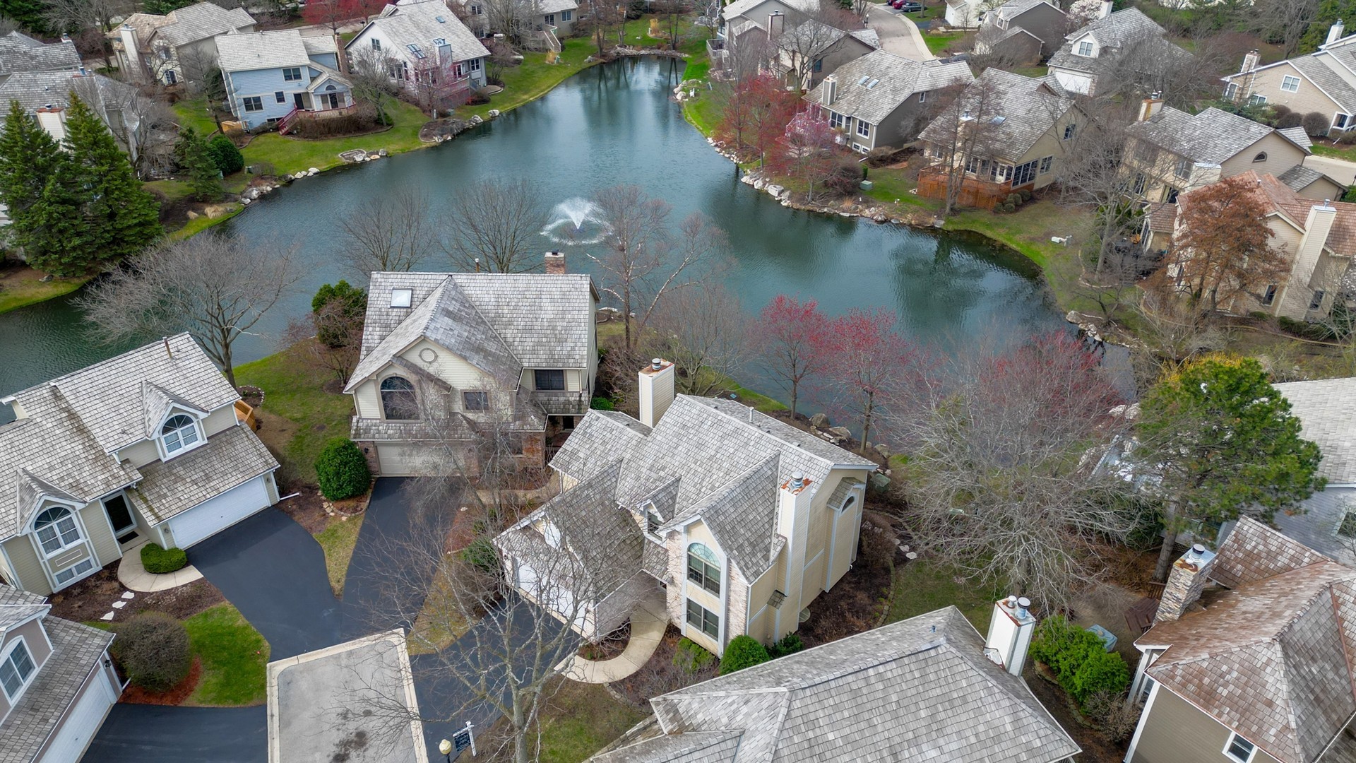 2286 Brookside Lane Aurora, IL 60502 - Photo 32 of 37 an aerial view of a house with a lake view