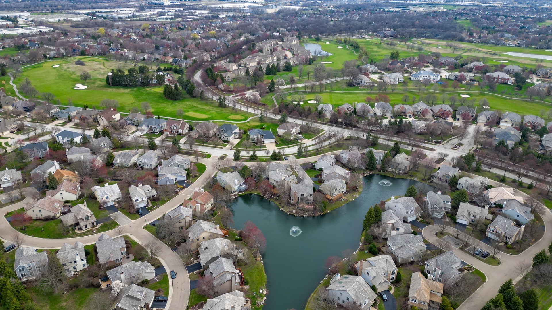 2286 Brookside Lane Aurora, IL 60502 - Photo 36 of 37 an aerial view of a house with a lake view