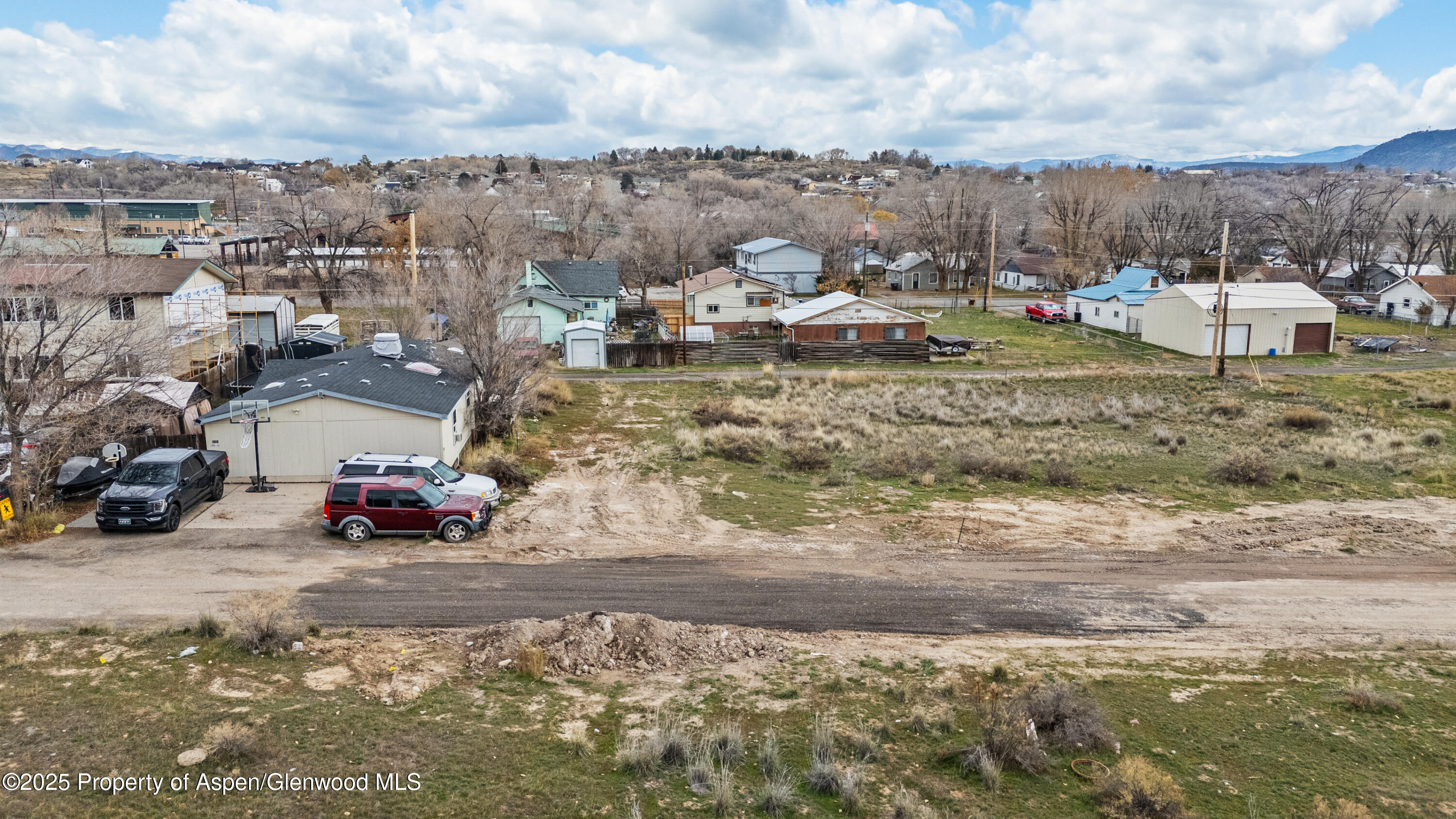 988 Stillwell Avenue Rifle, CO 81650 - Photo 5 of 10 a view of a town with big trees