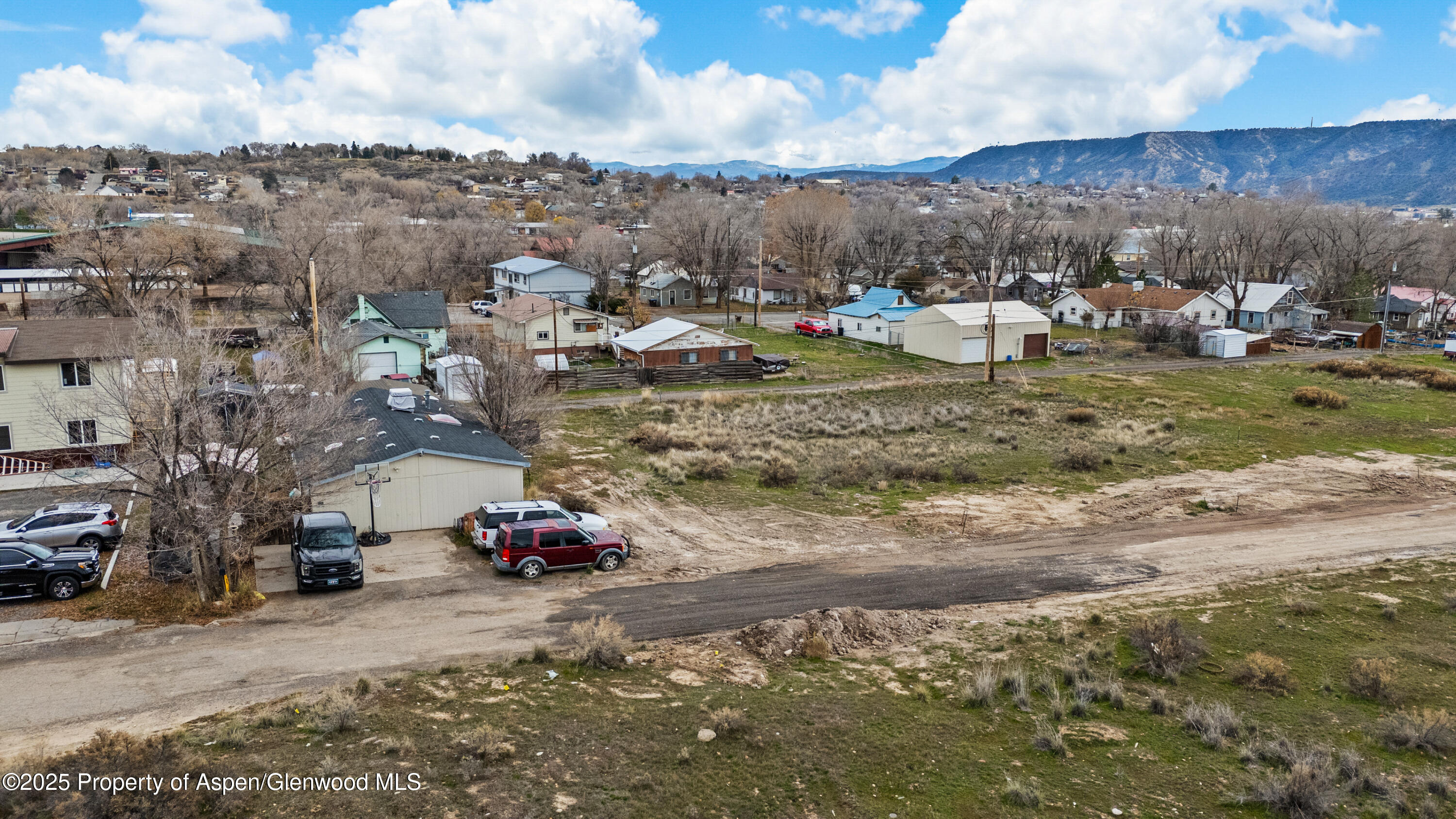 988 Stillwell Avenue Rifle, CO 81650 - Photo 6 of 10 a view of a town with barn
