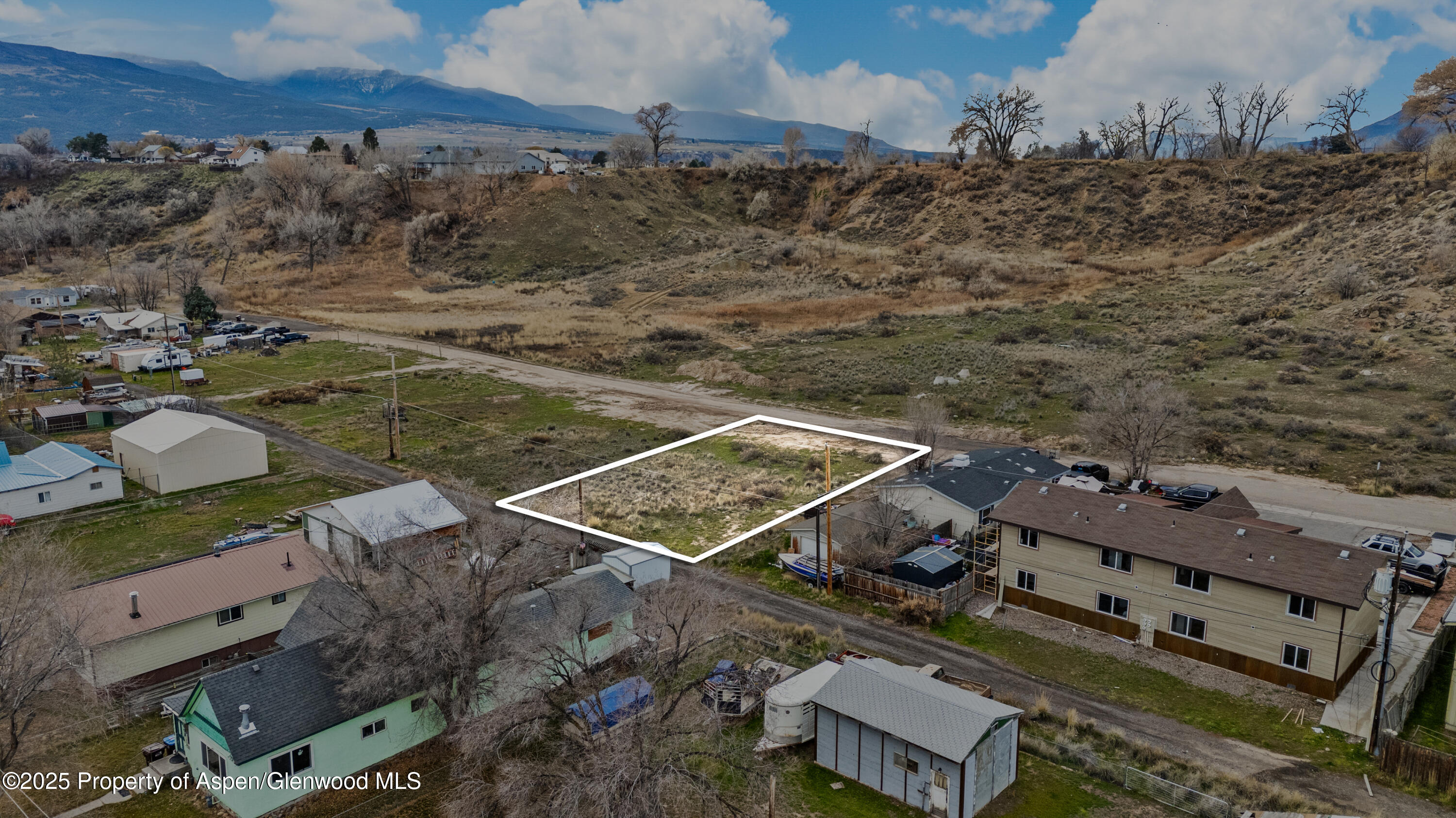 988 Stillwell Avenue Rifle, CO 81650 - Photo 8 of 10 an aerial view of house with yard