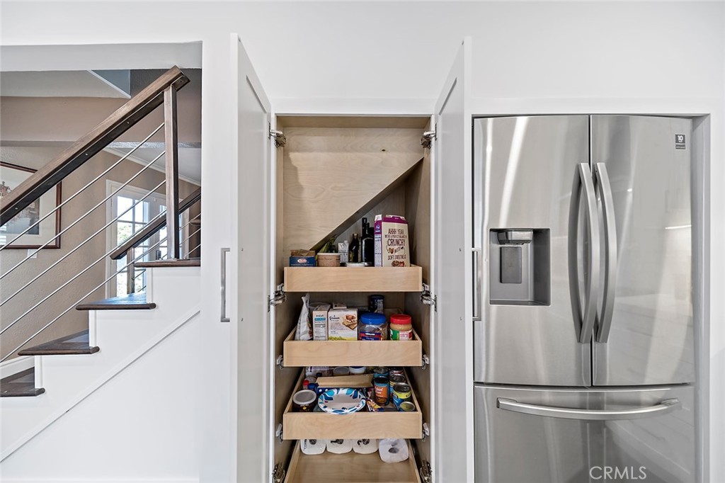 5733 2nd Street Long Beach, CA 90803 - Photo 22 of 32 a view of kitchen and utility room with refrigerator