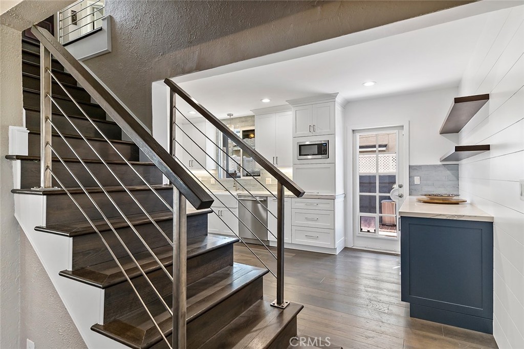 5733 2nd Street Long Beach, CA 90803 - Photo 10 of 32 a view of entryway and kitchen with wooden floor