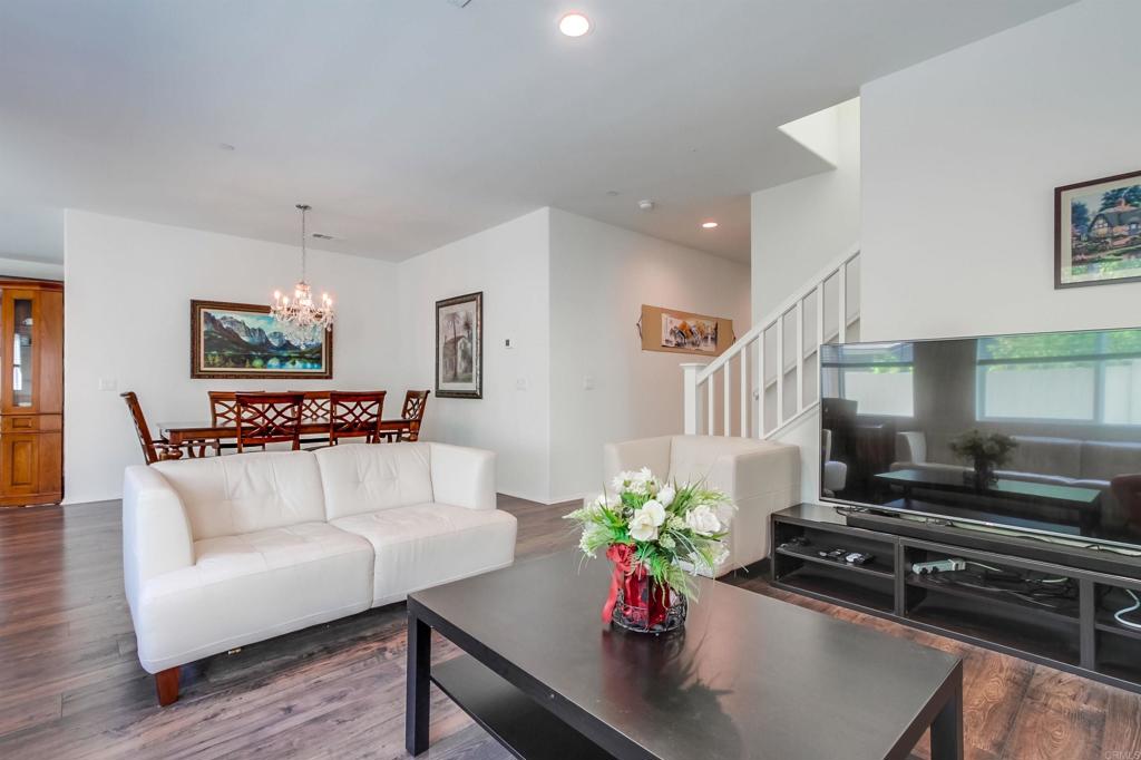 235 Spotted Saddle Way Fallbrook, CA 92028 - Photo 14 of 71 a living room with furniture potted plant and a fireplace