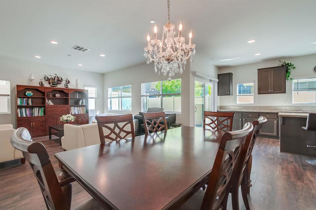 235 Spotted Saddle Way Fallbrook, CA 92028 - Photo 18 of 71 a view of a dining room with furniture window and outside view