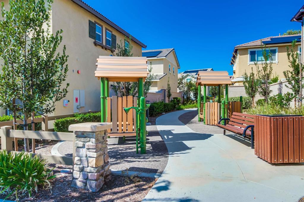 235 Spotted Saddle Way Fallbrook, CA 92028 - Photo 48 of 71 a view of a house with backyard and sitting area