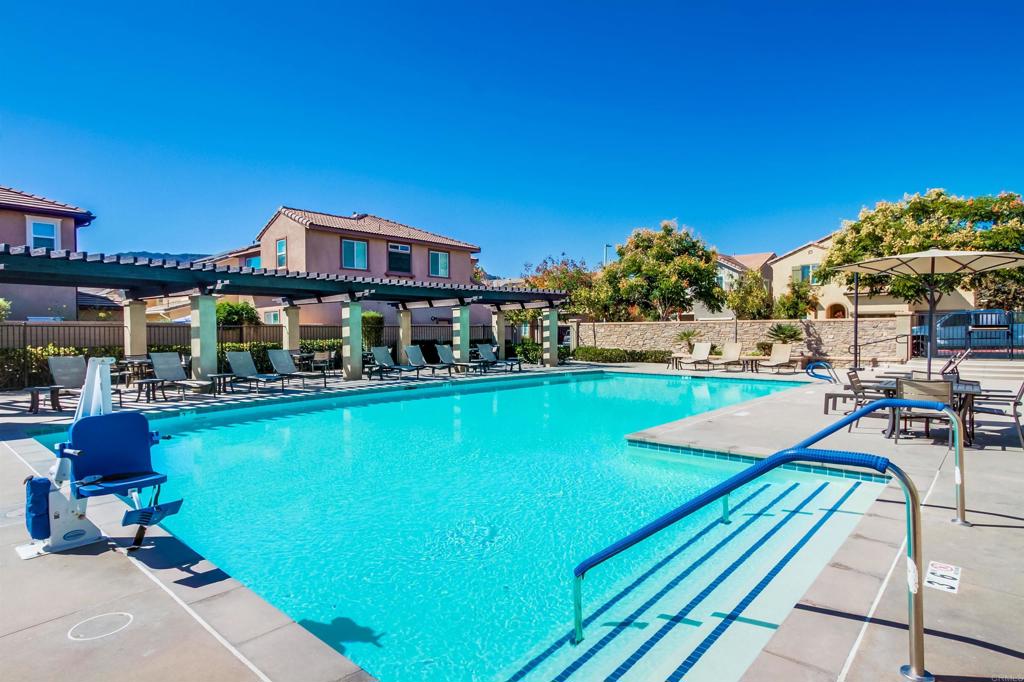 235 Spotted Saddle Way Fallbrook, CA 92028 - Photo 52 of 71 a view of a swimming pool with sitting area
