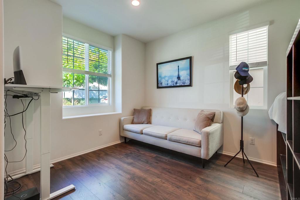 235 Spotted Saddle Way Fallbrook, CA 92028 - Photo 6 of 71 a living room with furniture a flat screen tv and a window