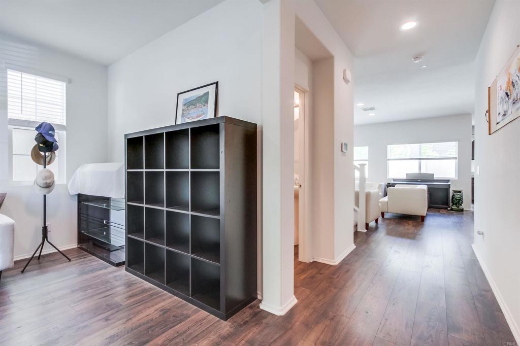 235 Spotted Saddle Way Fallbrook, CA 92028 - Photo 9 of 71 a living room with furniture and a wooden floor