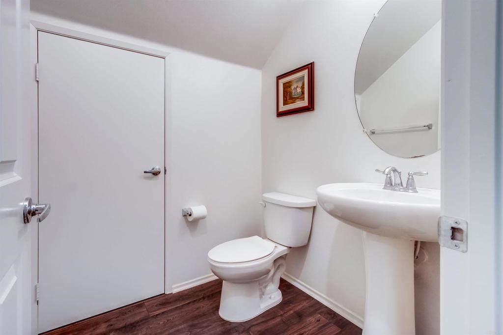 235 Spotted Saddle Way Fallbrook, CA 92028 - Photo 10 of 71 a bathroom with a toilet sink and mirror