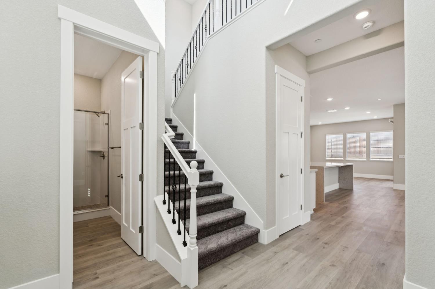 3031 Pocosol Way Rancho Cordova, CA 95742 - Photo 12 of 47 a view of a hallway with wooden floor and entryway