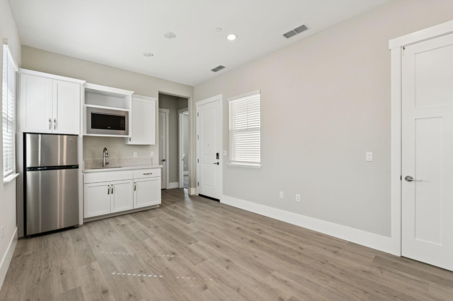 3031 Pocosol Way Rancho Cordova, CA 95742 - Photo 22 of 47 a view of kitchen with wooden floor and electronic appliances