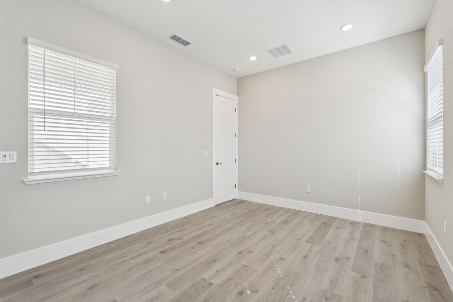 3031 Pocosol Way Rancho Cordova, CA 95742 - Photo 23 of 47 wooden floor in an empty room with a window