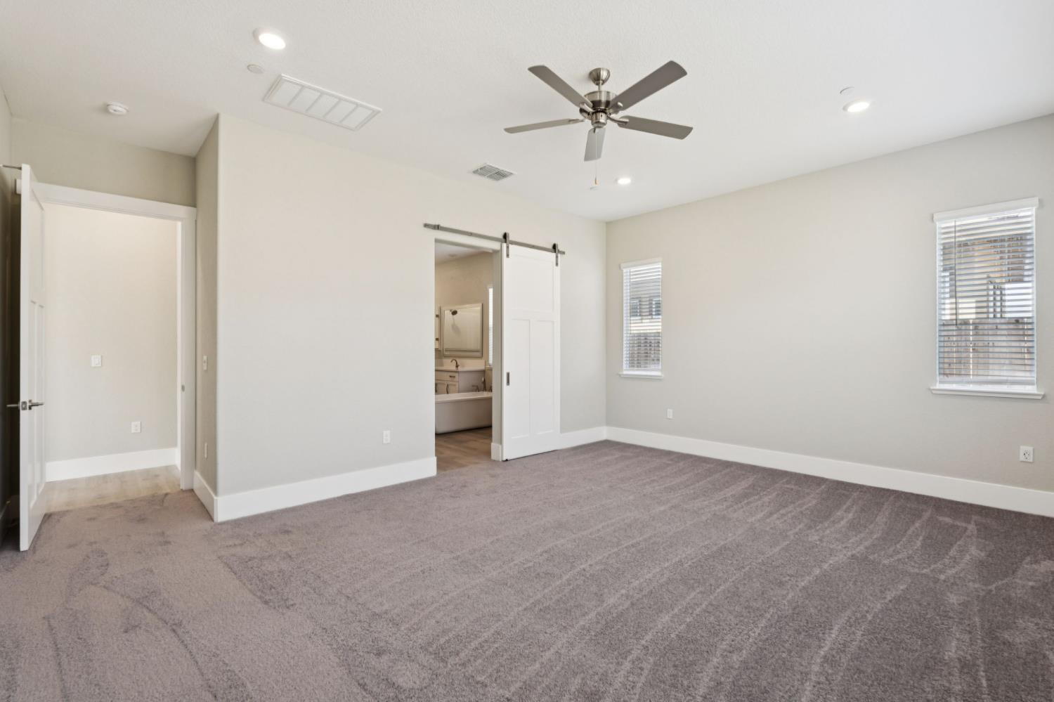 3031 Pocosol Way Rancho Cordova, CA 95742 - Photo 32 of 47 an empty room with windows and closet