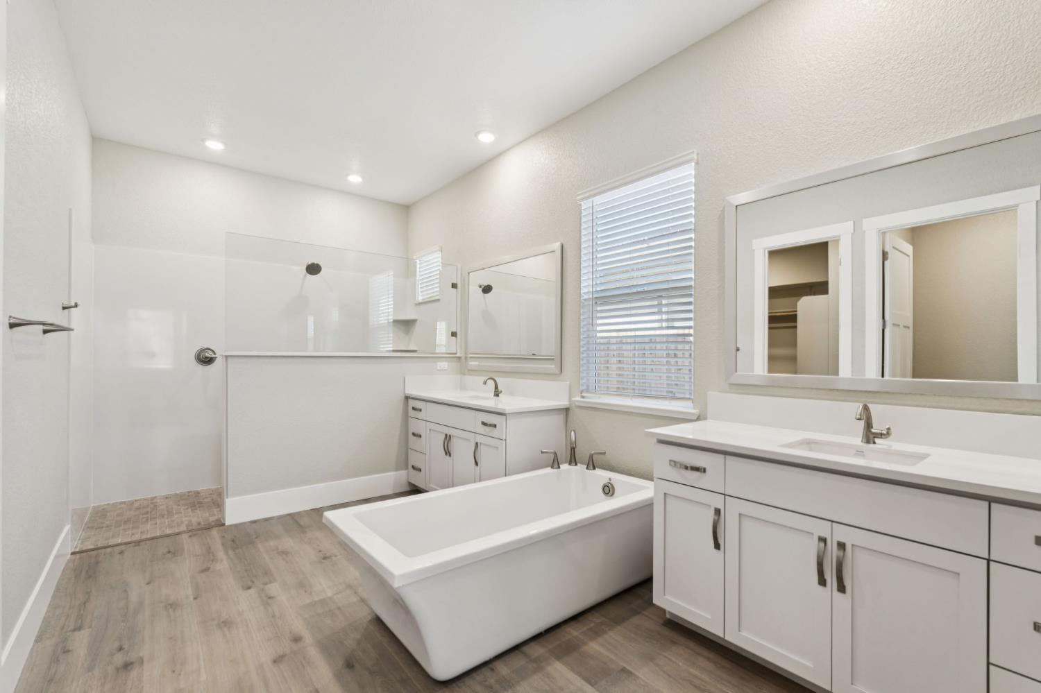 3031 Pocosol Way Rancho Cordova, CA 95742 - Photo 35 of 47 a bathroom with a tub sink and mirror