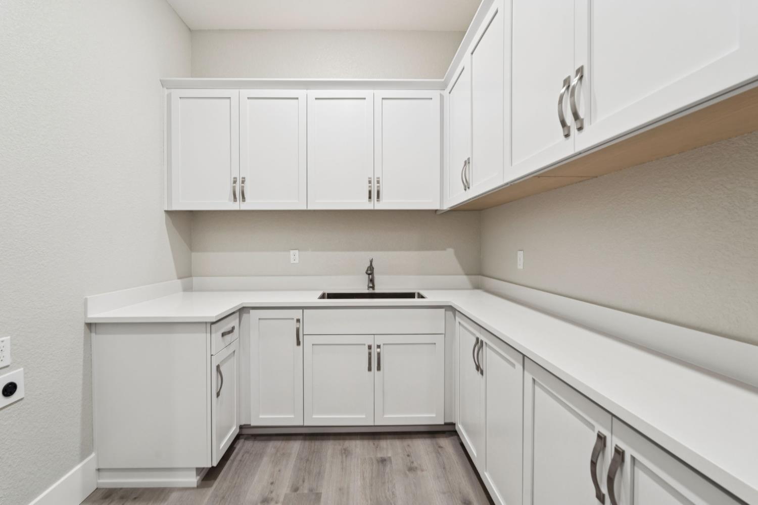 3031 Pocosol Way Rancho Cordova, CA 95742 - Photo 38 of 47 a kitchen with a sink dishwasher and cabinets