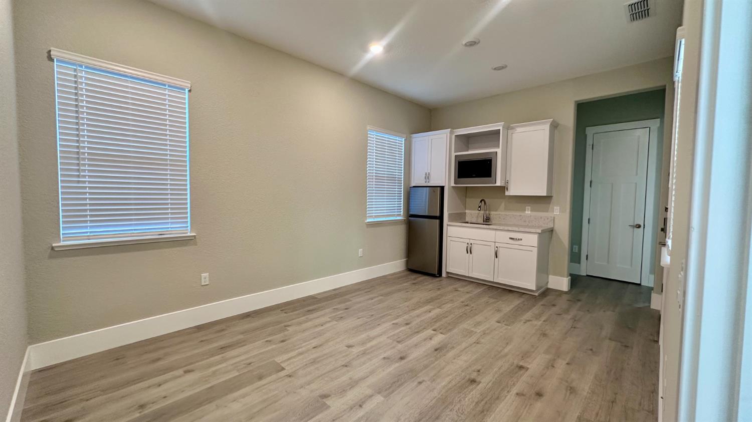 3031 Pocosol Way Rancho Cordova, CA 95742 - Photo 47 of 47 a view of kitchen with stainless steel appliances kitchen island wooden floor and window