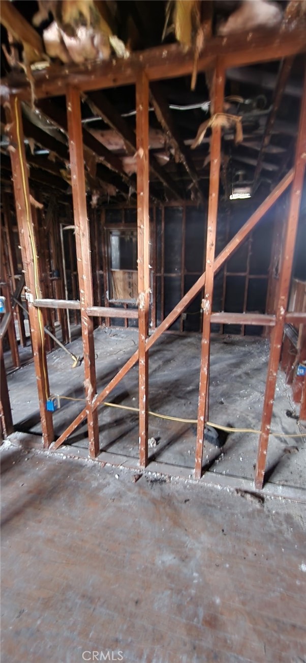 1313 South California Avenue Compton, CA 90221 - Photo 9 of 12 a view of an empty room with wooden floor
