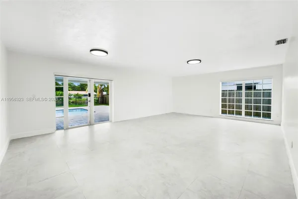 an empty room with windows