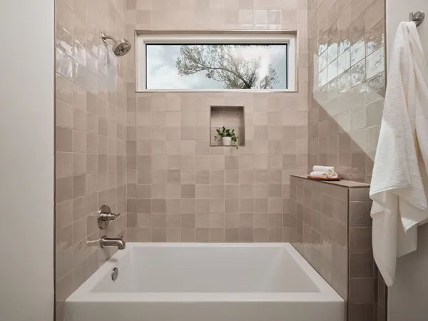 a bathroom with a bathtub