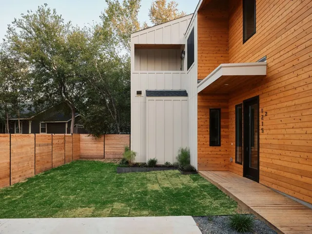 a view of a backyard with a garden