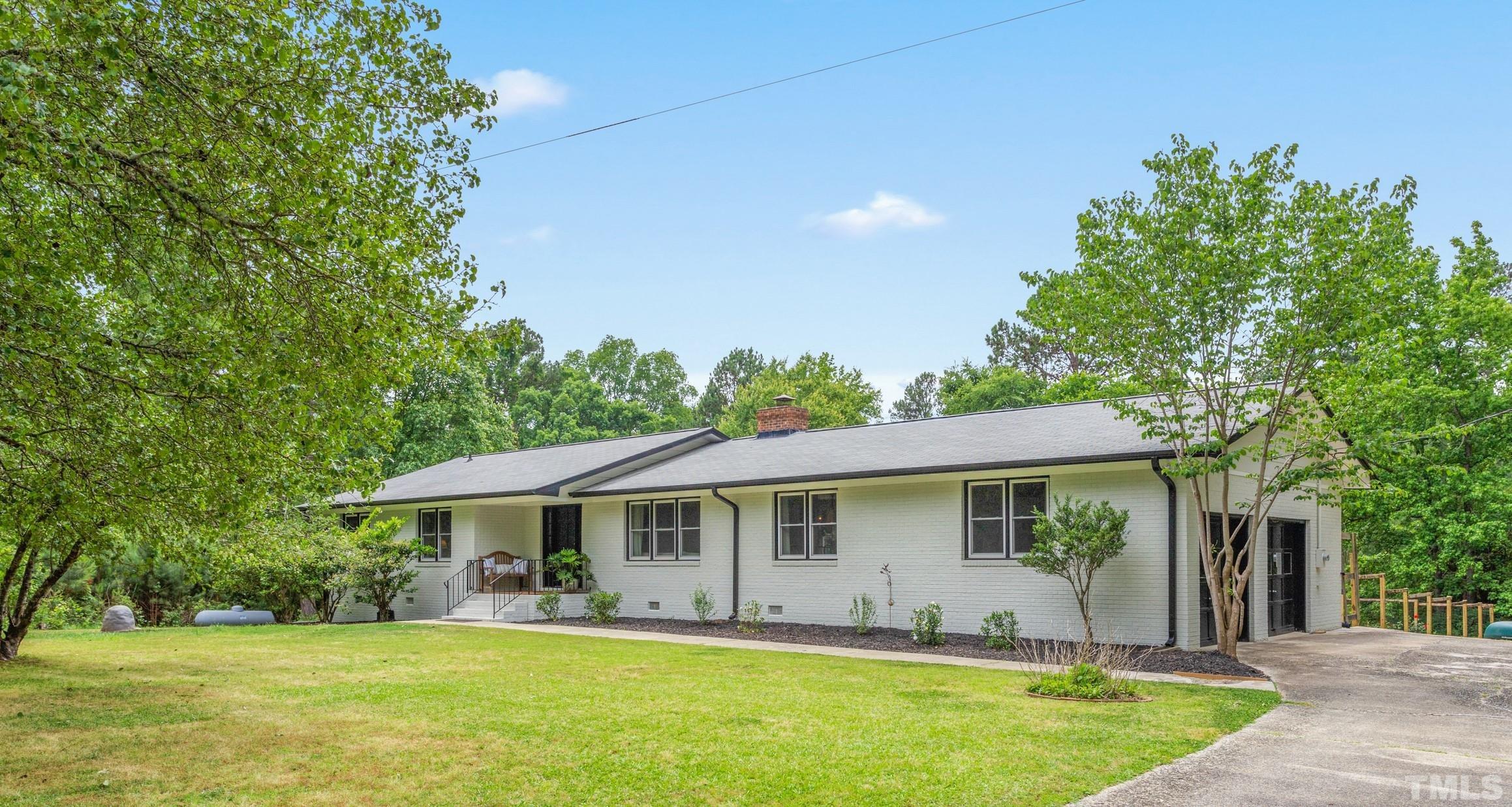 238 Alston Road Apex, NC 27523 - Photo 1 of 50 a view of a house with a swimming pool