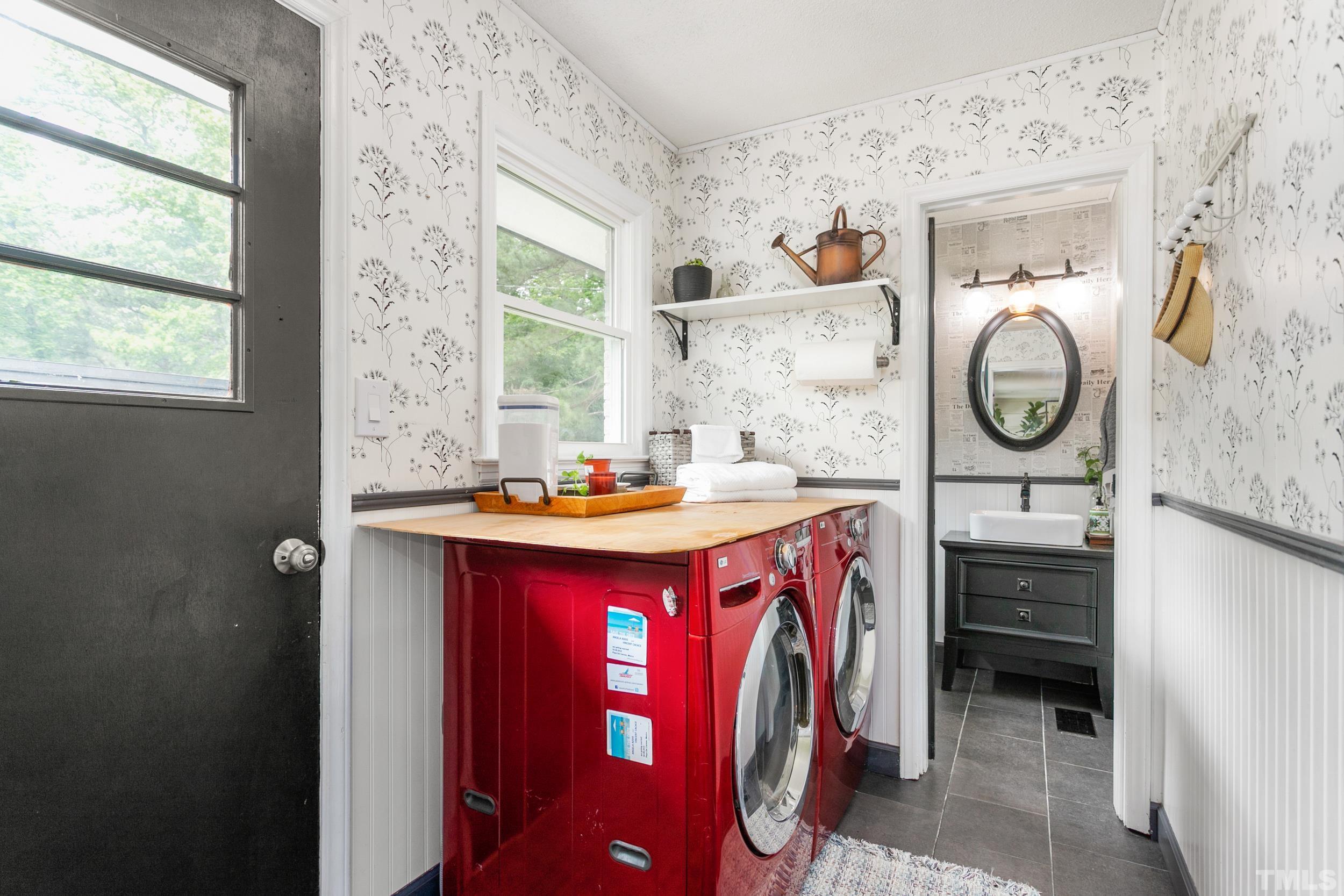 238 Alston Road Apex, NC 27523 - Photo 21 of 50 a bathroom with a sink and a mirror