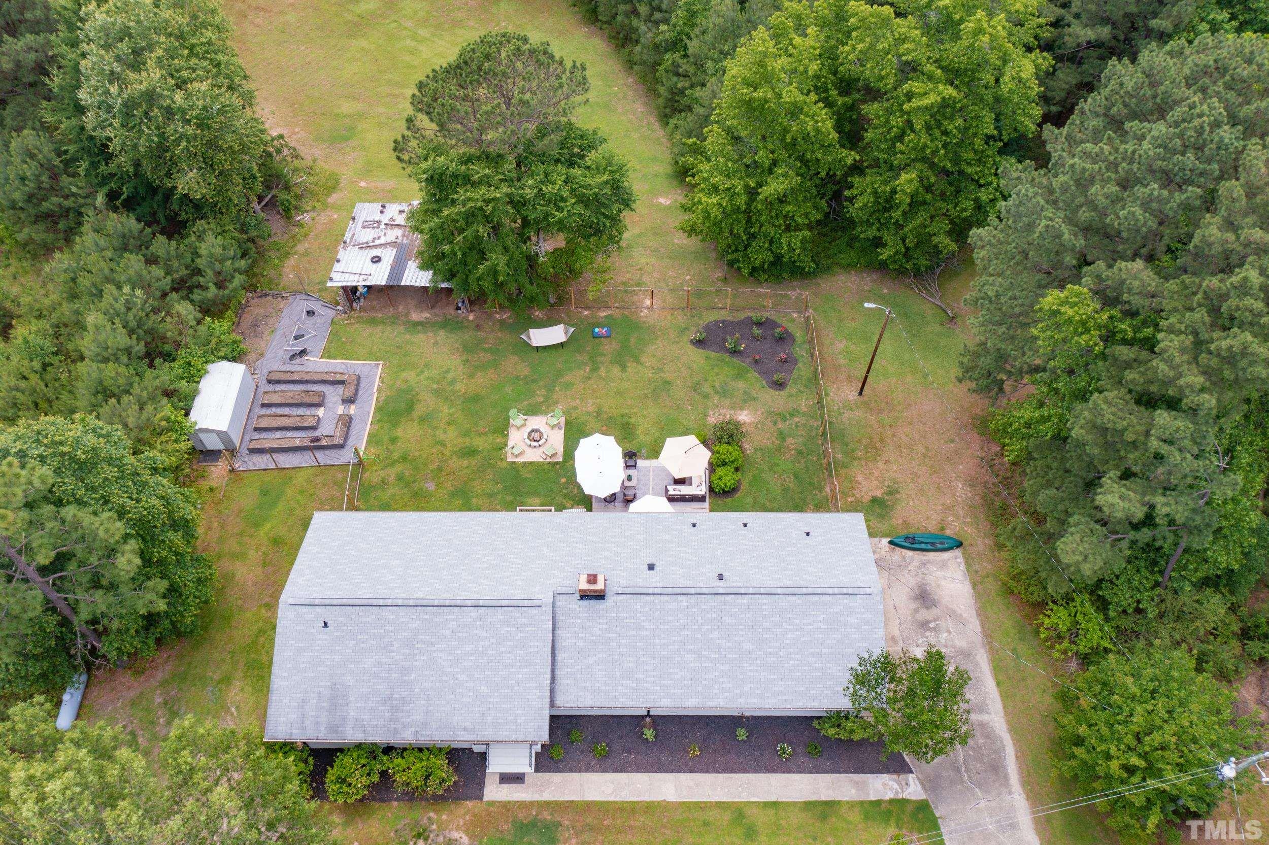 238 Alston Road Apex, NC 27523 - Photo 41 of 50 an aerial view of a house with a yard basket ball court and outdoor seating
