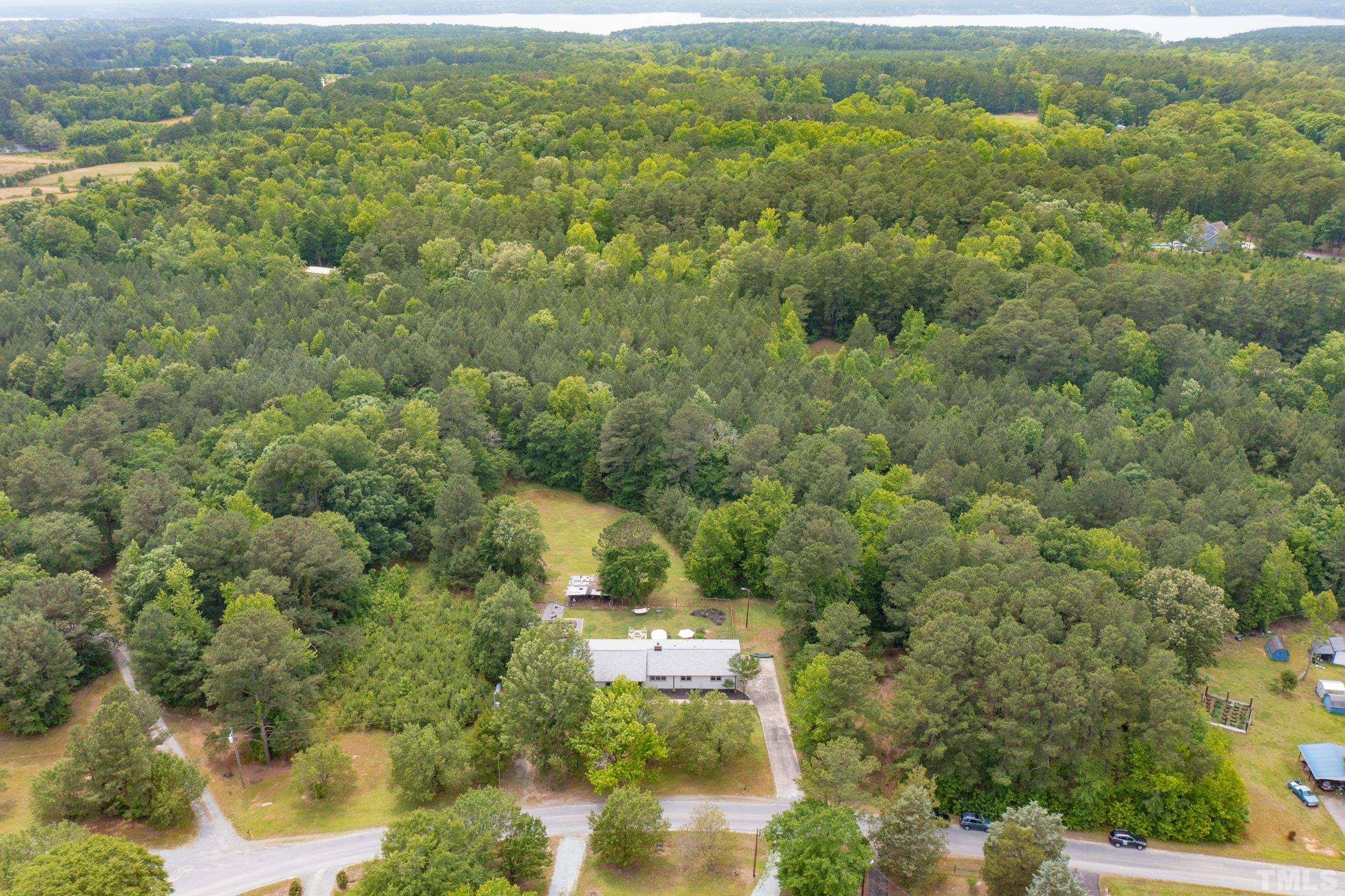 238 Alston Road Apex, NC 27523 - Photo 50 of 50 an aerial view of residential houses with outdoor space and trees
