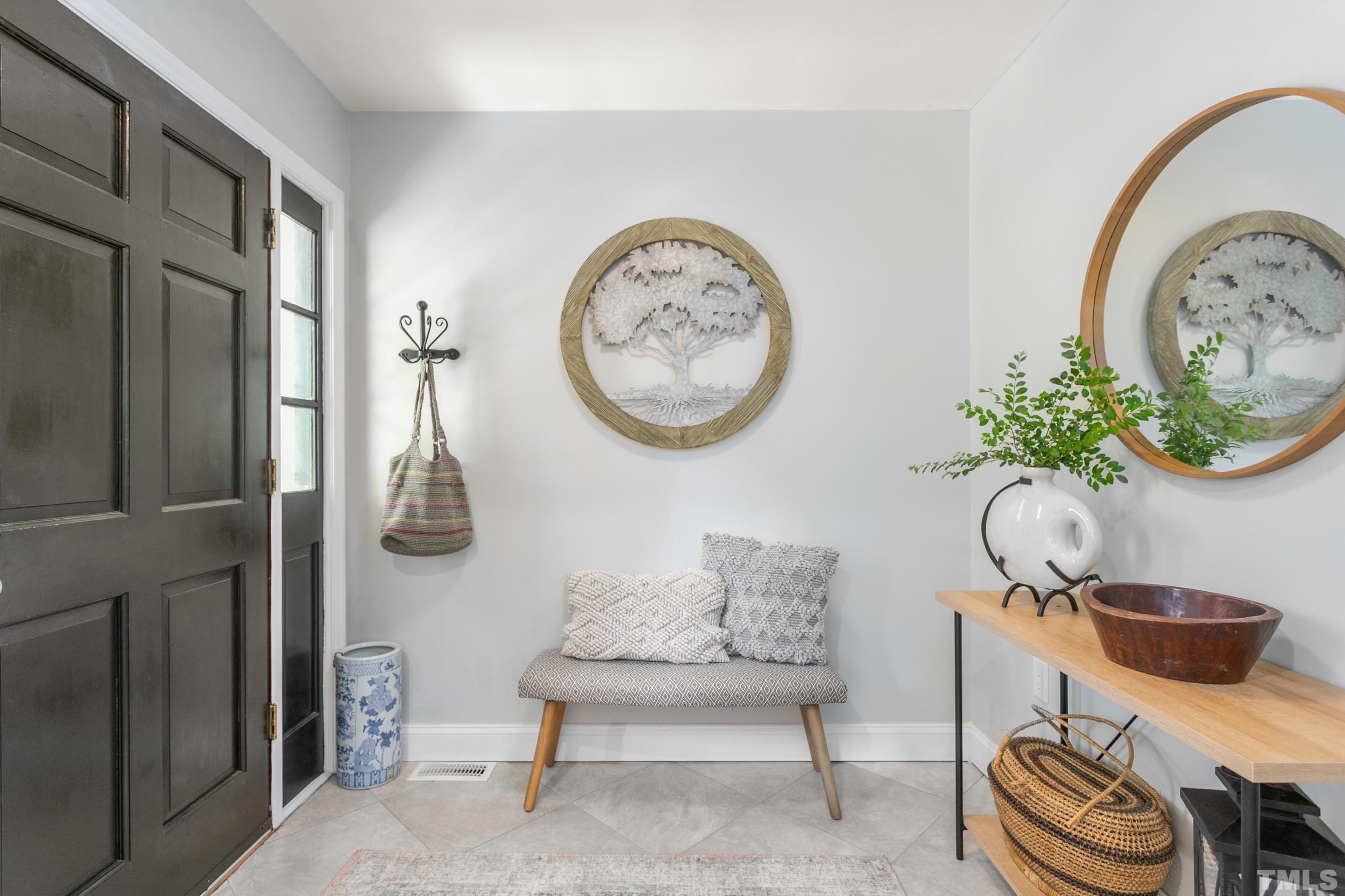 238 Alston Road Apex, NC 27523 - Photo 6 of 50 a picture of a table and a chandelier