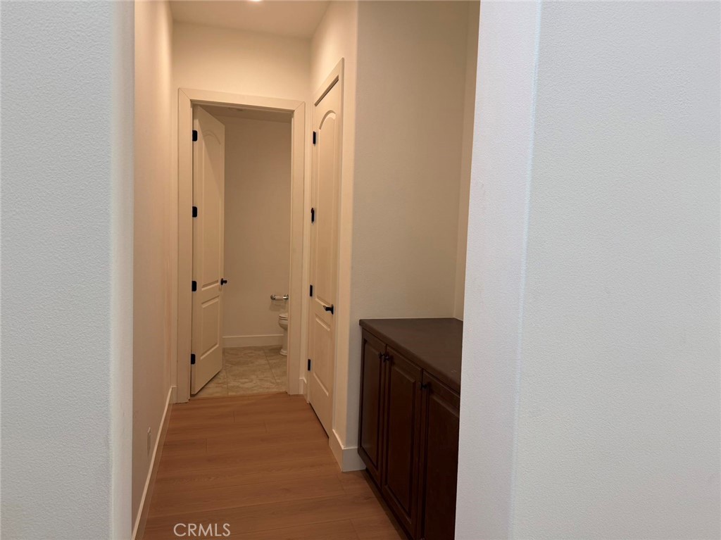 101 Interstellar Irvine, CA 92618 - Photo 13 of 24 a view of a bathroom from a hallway