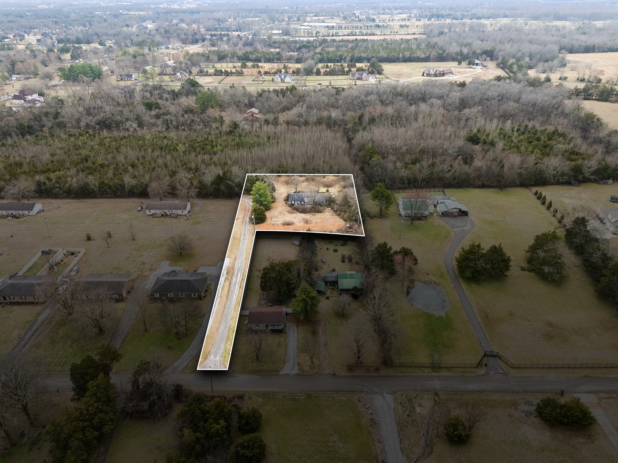 1187 Lawrence Road Murfreesboro, TN 37128 - Photo 1 of 13 an aerial view of residential houses with outdoor space