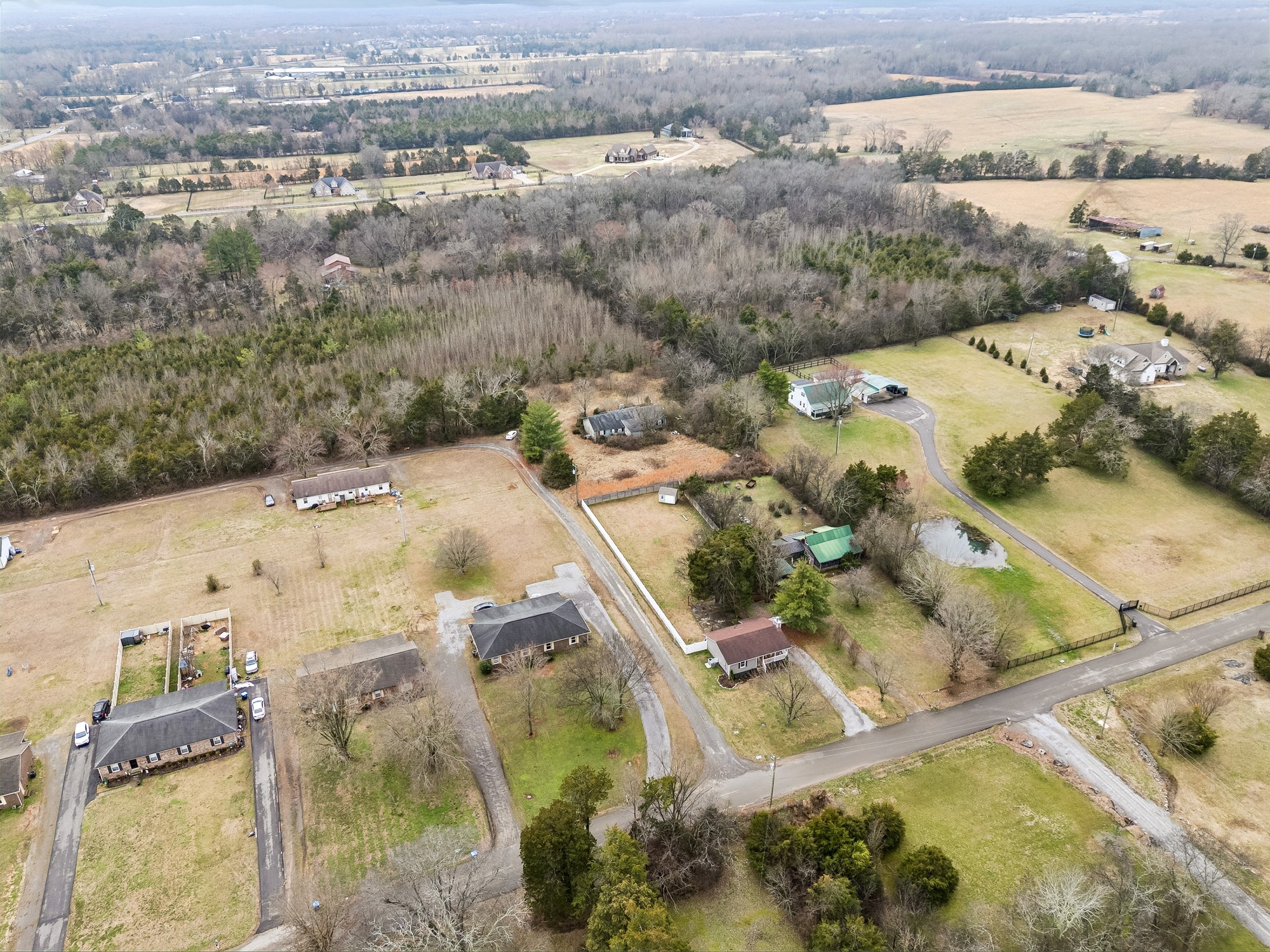 1187 Lawrence Road Murfreesboro, TN 37128 - Photo 11 of 13 an aerial view of residential houses with outdoor space