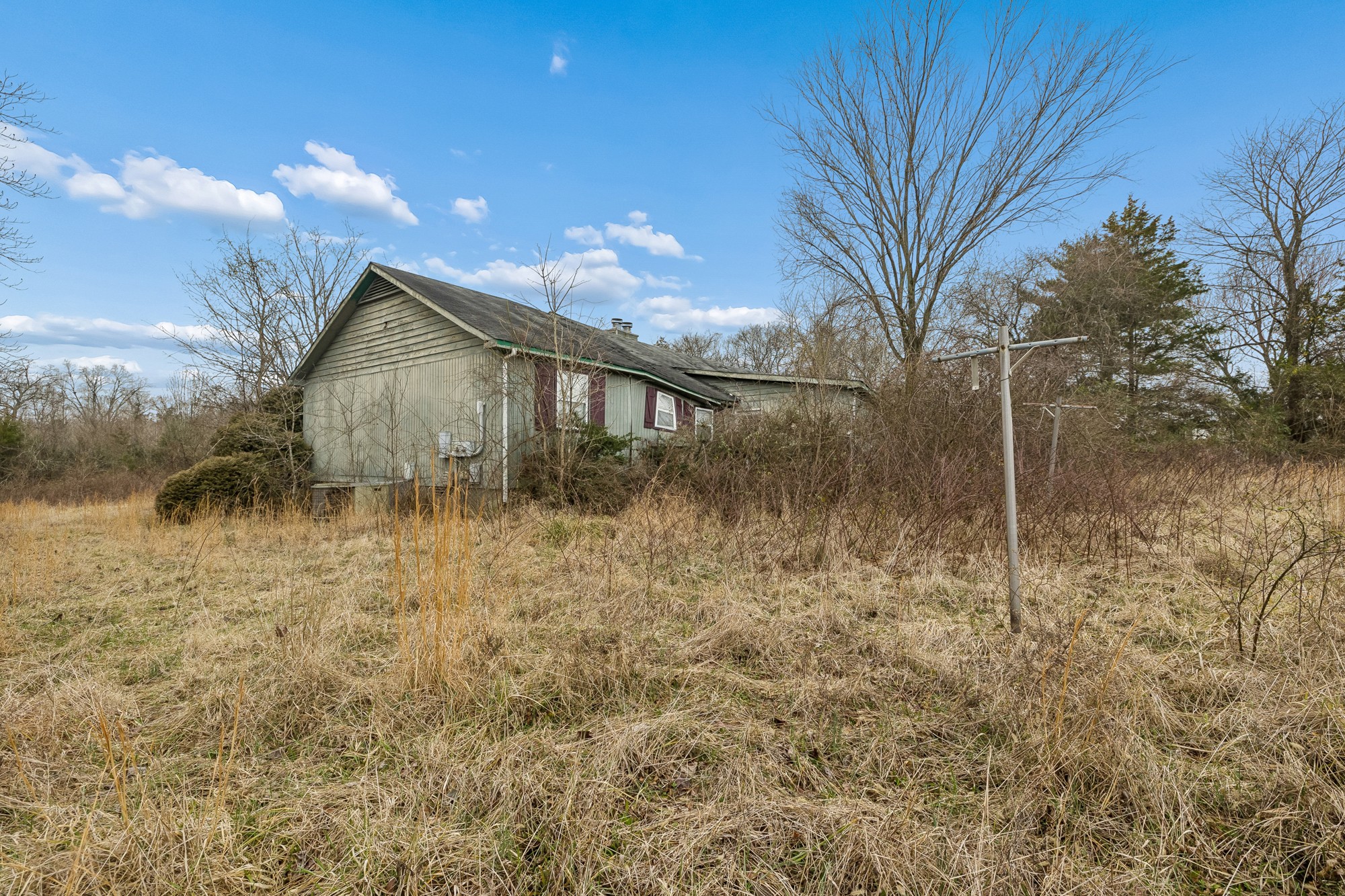 1187 Lawrence Road Murfreesboro, TN 37128 - Photo 3 of 13 a view of a house with a yard