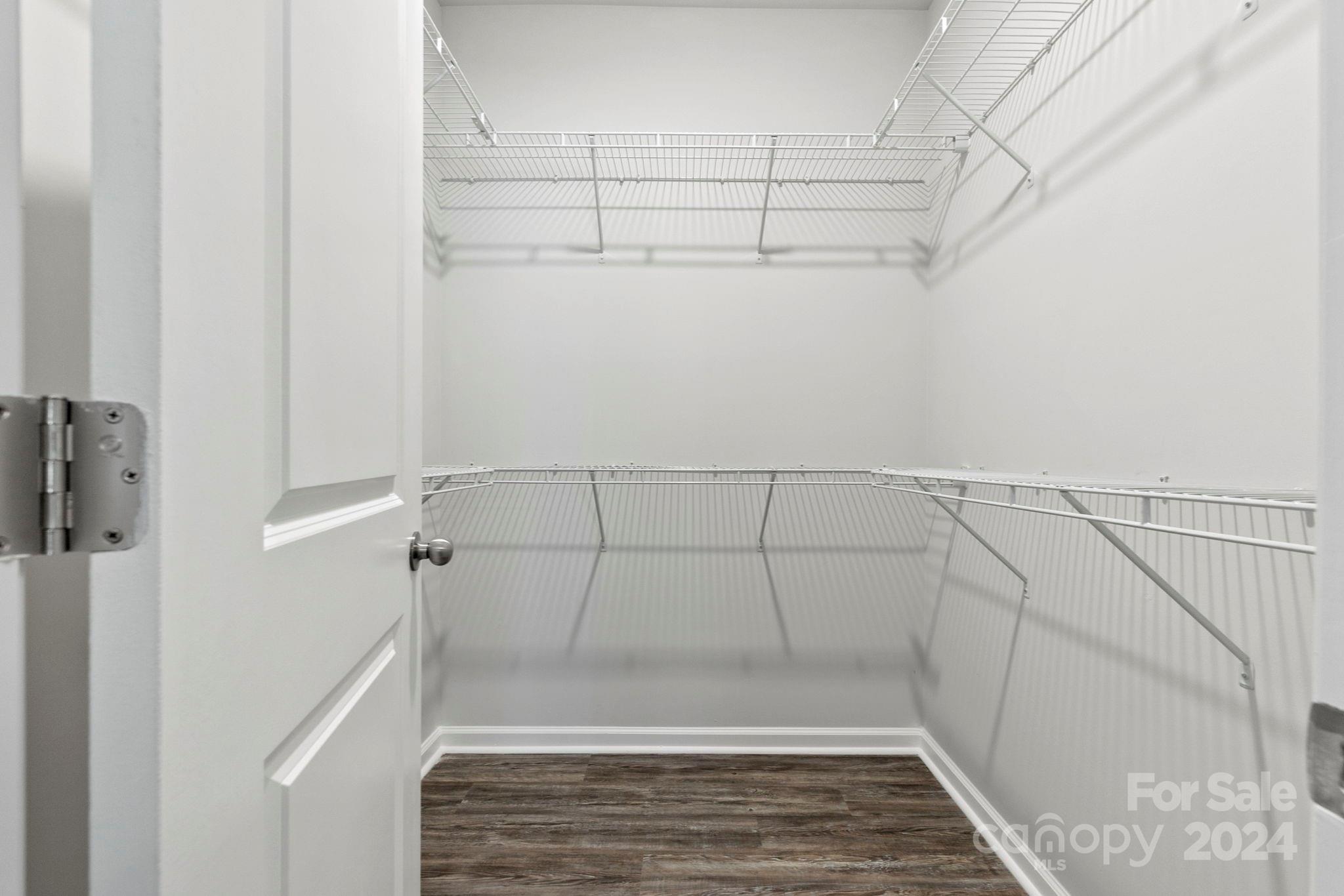 8204 Mccormick Street Terrell, NC 28682 - Photo 24 of 32 a view of a room with racks on the wall