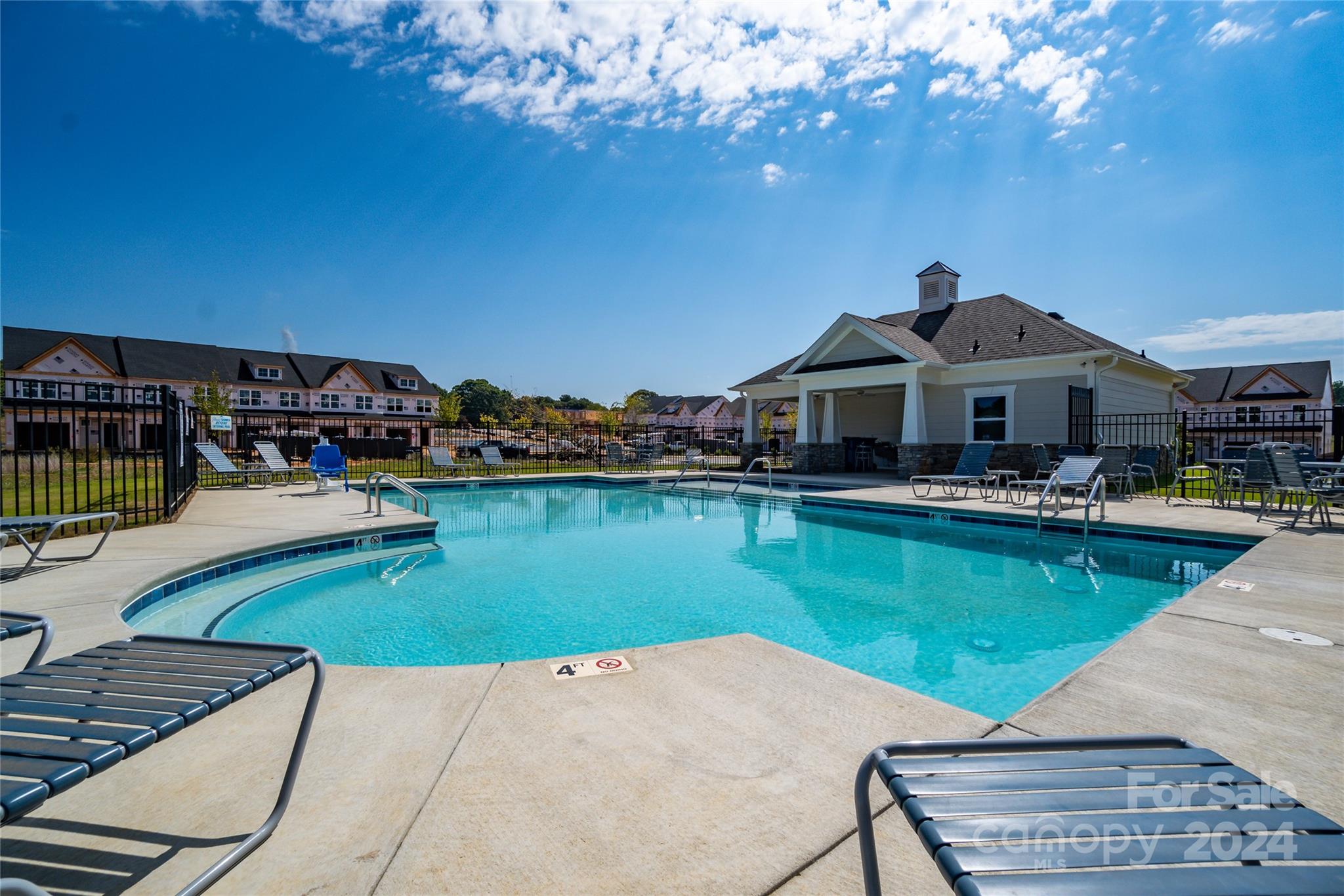 8204 Mccormick Street Terrell, NC 28682 - Photo 30 of 32 a front view of a house with swimming pool yard and outdoor seating