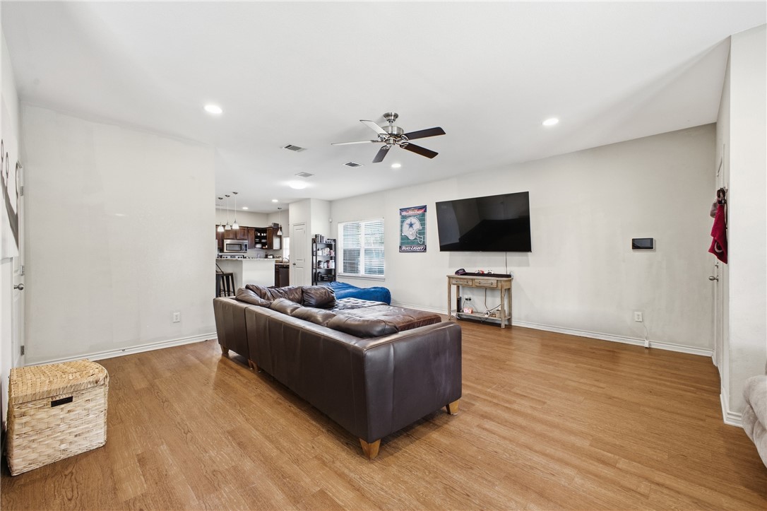 4400 Milam Street Bryan, TX 77801 - Photo 4 of 25 a living room with furniture and a flat screen tv