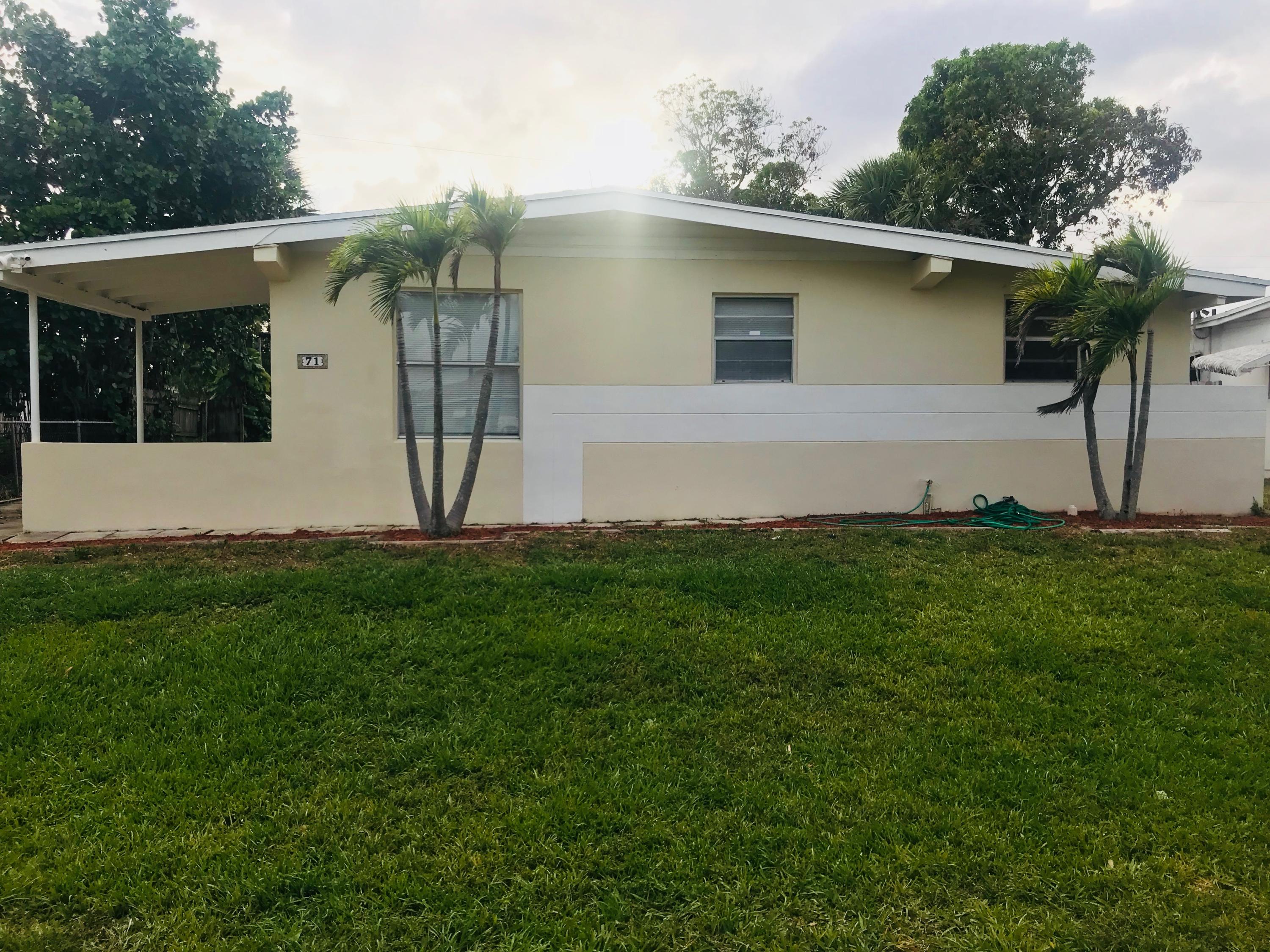 71 Davis Road Palm Springs, FL 33461 - Photo 1 of 7 Front