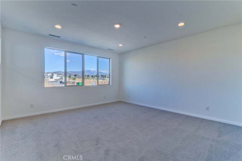 130 Spectacle Irvine, CA 92618 - Photo 13 of 38 a view of an empty room with a window