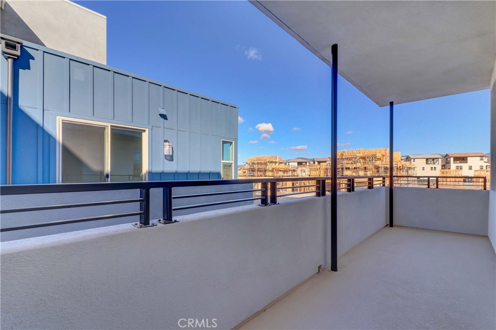 130 Spectacle Irvine, CA 92618 - Photo 15 of 38 a kitchen with stainless steel appliances kitchen island granite countertop a stove and a refrigerator