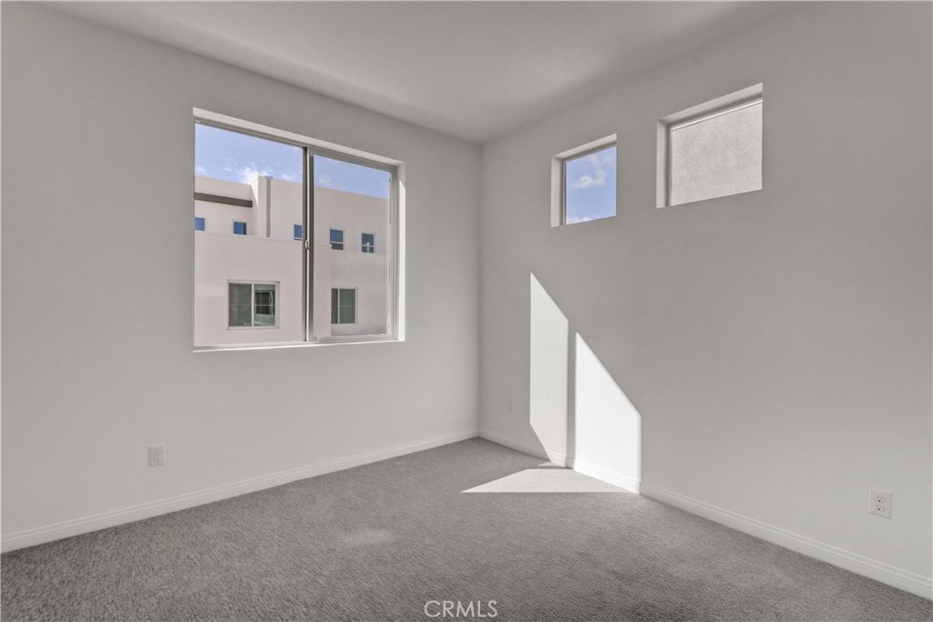 130 Spectacle Irvine, CA 92618 - Photo 21 of 38 a view of an empty room with a window