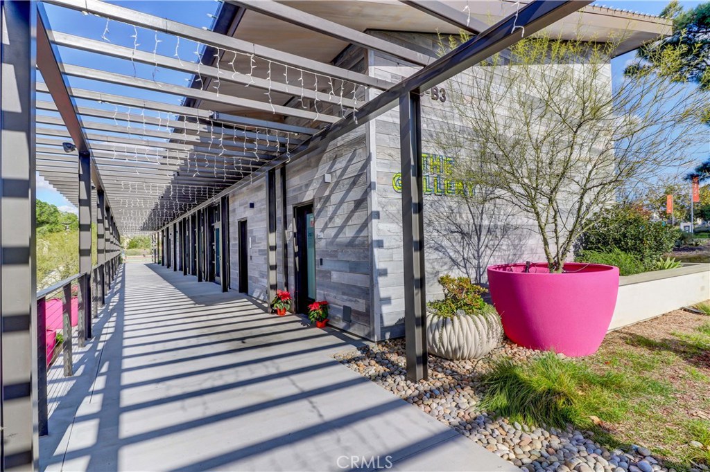 130 Spectacle Irvine, CA 92618 - Photo 28 of 38 a view of a house with street and wooden stairs