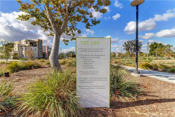 a view of a street with a building in the background