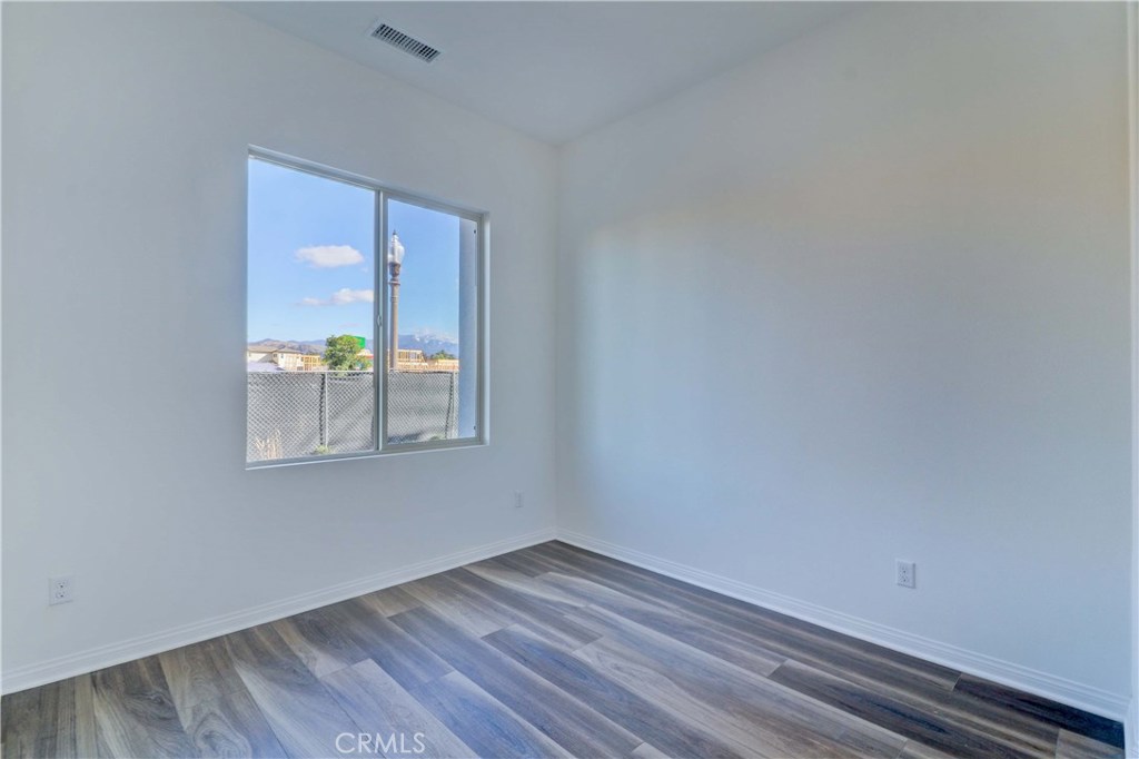 130 Spectacle Irvine, CA 92618 - Photo 7 of 38 a view of an empty room and window