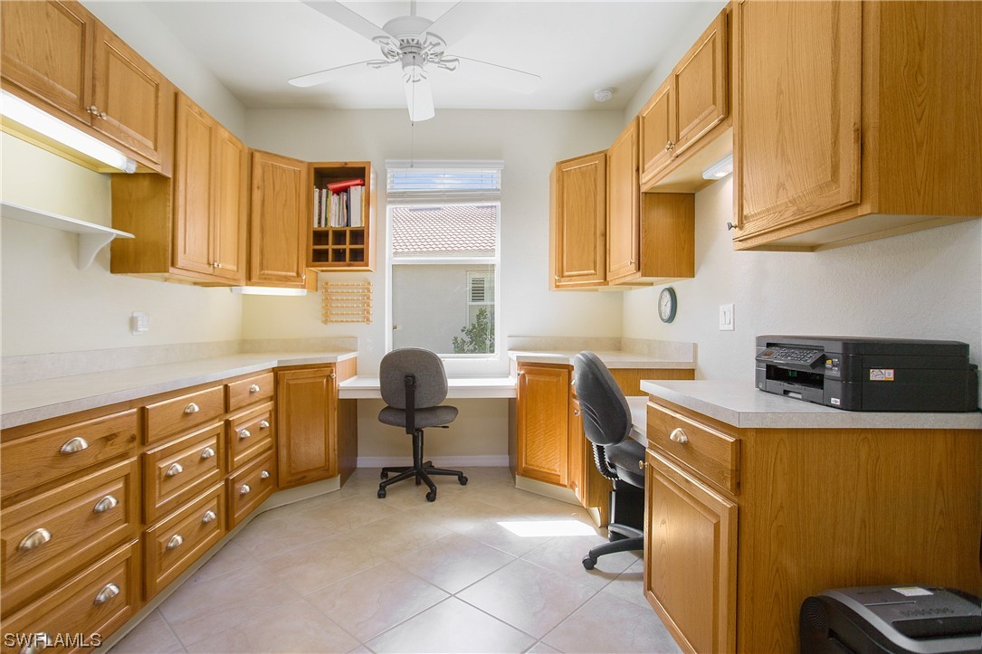 7948 Princeton Drive Naples, FL 34104 - Photo 23 of 35 a view of a kitchen with appliances