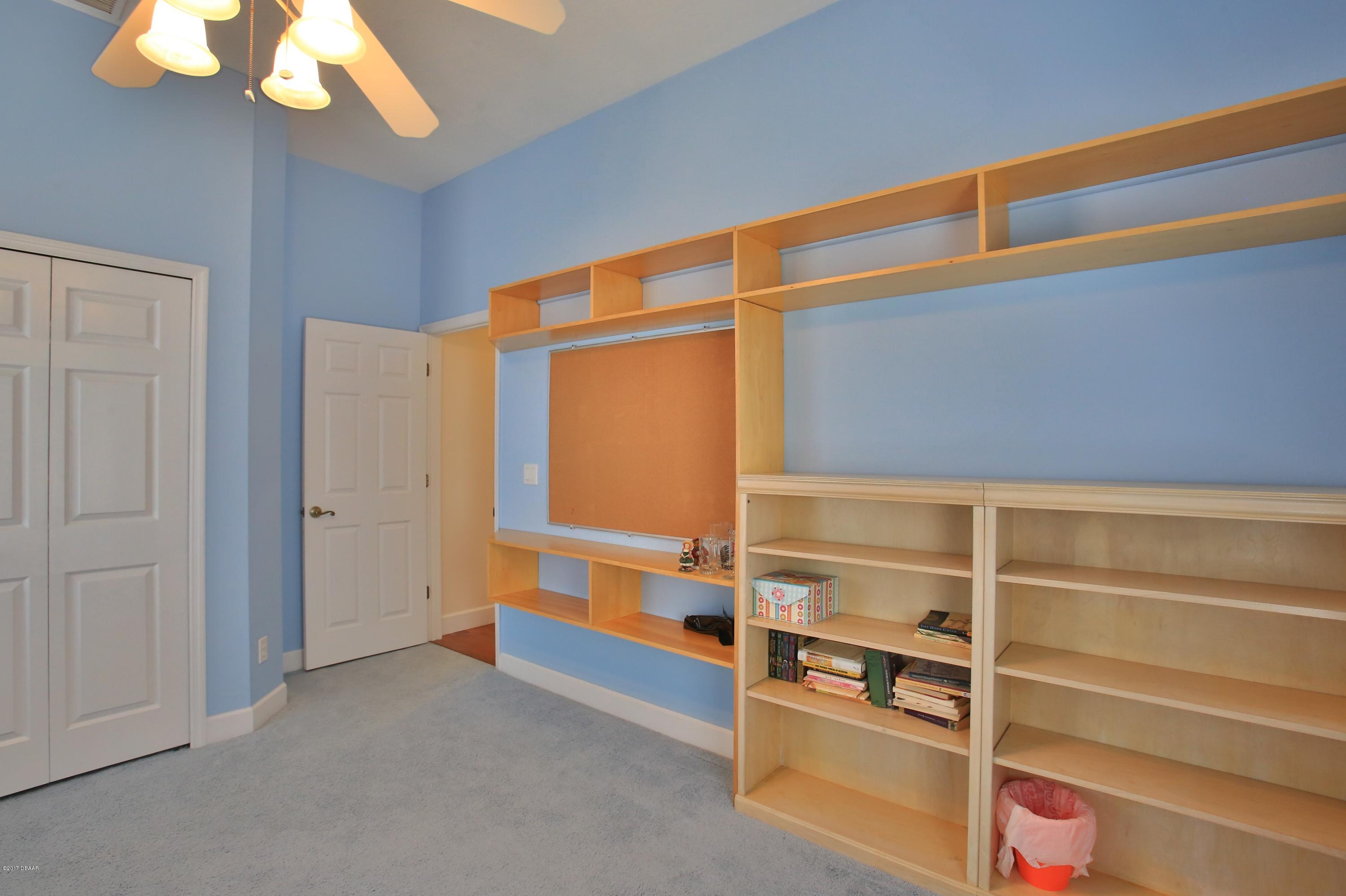 5880 Riverside Drive Port Orange, FL 32127 - Photo 23 of 31 Guest Bedroom