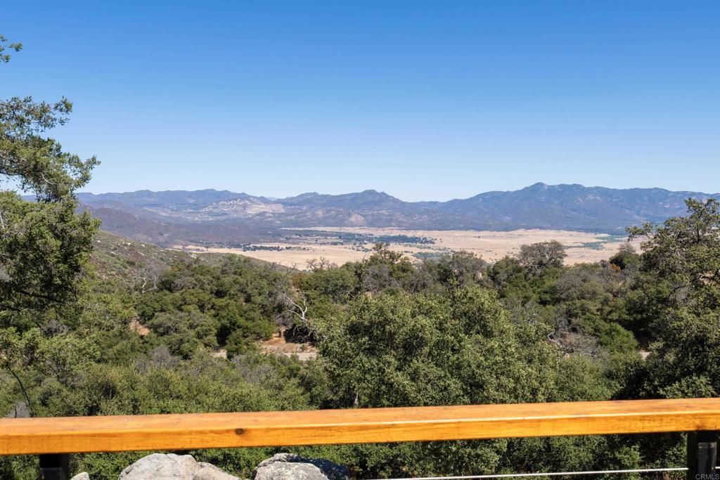 25770 East Grade Road Santa Ysabel, CA 92070 - Photo 12 of 75 a view of a big yard with mountain