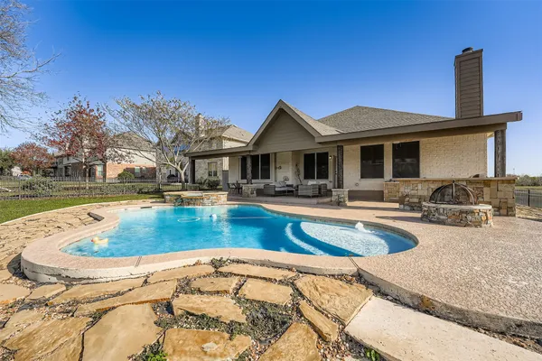 a view of a house with swimming pool