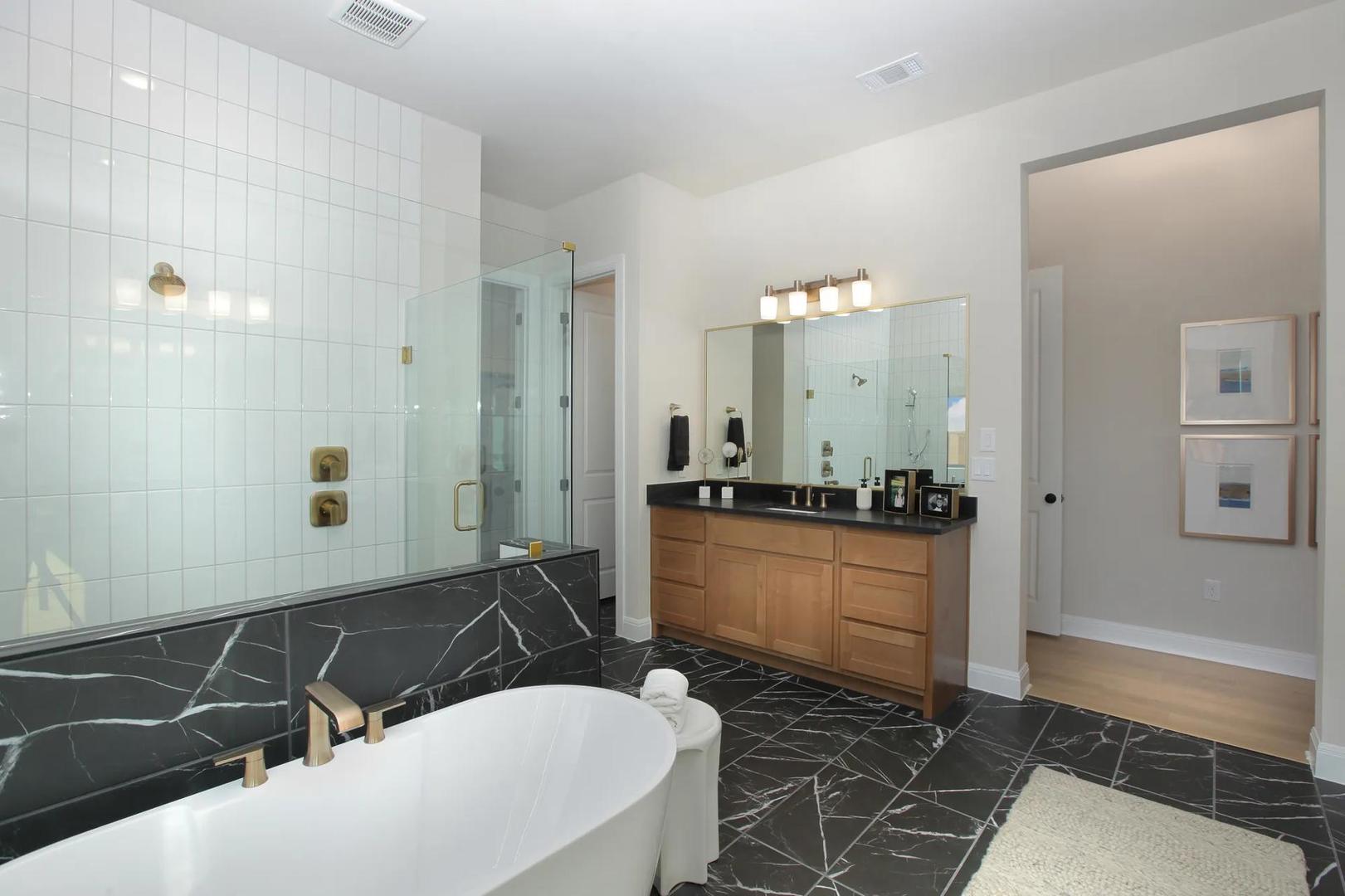 2033 Morning Mist Drive Georgetown, TX 78628 - Photo 26 of 36 a bathroom with a sink and a mirror
